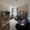 Photo 2: Shared living toom