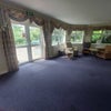 Photo 13: Communal Lounge leading to garden 