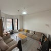 Photo 5: Living Room (50’ Smart TV)