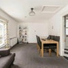 Photo 5: Upstairs living room and kitchen