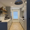Photo 2: Bright open plan kitchen