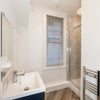 Photo 7: 2 of 2 shared bathrooms