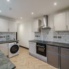 Photo 12: Communal Area