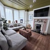 Photo 3: Large stylish living room with original features