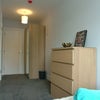 Photo 3: Large furnished bedroom