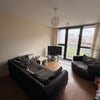 Photo 4: Living room with balcony