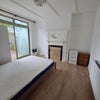 Photo 3: Living room- bed to be removed 