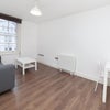 Photo 3: Bright living area