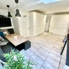 Photo 14: Communal Kitchen and Living Area