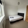 Photo 2: Room has bed linen duvet etc