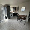 Photo 2: Kitchen area 