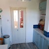 Photo 7: Integral fridge, freezer in utility (off lounge)