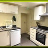 Photo 5: A Fully Fitted Compact Kitchen shared with one other Professional..