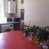 Photo 9: Kitchen showing washing machine etc