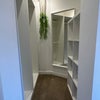 Photo 6: Huge walk in wardrobe for all your stuff