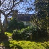 Photo 1: Detached cottage on side of valley