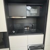 Photo 4: Kitchentte with oven/microwave/hob and fridge