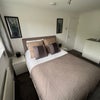 Photo 8: Large room with bed side tables and chest of drawers