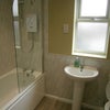 Photo 9: Three shower/bathrooms