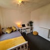 Photo 7: Front Left Room
