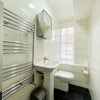 Photo 12: Shared Toilet