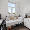 Photo 3: Bright double room with smart TV and natural light