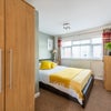 Photo 3: Downstairs bedroom with an ensuite and own lounge.