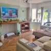 Photo 3: 1 of 2 living room spaces 