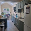 Photo 2: Kitchen with seating