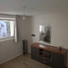 Photo 4: TV unit, wall mounted mirror with lamb above and small shelves