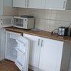 Photo 6: The kitchen