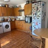 Photo 7: Kitchen with washer, tumble dryer and dishwasher