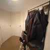 Photo 5: Coat rack outside bedroom