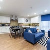 Photo 6: Shared living area/kitchen