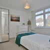 Photo 2: Bright and sunny bedroom