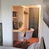 Photo 4: The hanging space extends back to accommodate bulky item storage