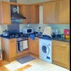 Photo 2: Kitchen area