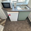 Photo 3: kitchenette inside bedroom