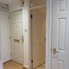 Photo 6: Hallway with storage