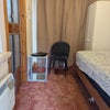 Photo 2: Room amd front door behind the curtain