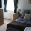 Photo 2: Lovely fresh room with small double bed. 