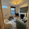 Photo 6: Living room - TV, sofa, coffee table, chair, lamp