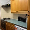 Photo 5: Kitchen - gas hob, oven, kettle, toaster, washing machine, fridge, freezer, microwave