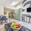 Photo 5: LARGE KITCHEN/COMMUNAL AREA 