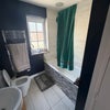 Photo 2: Shared bathroom with bathtub and shower