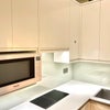 Photo 5: Combination microwave, fridge/freezer, induction hob