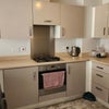 Photo 2: Shared kitchen and living space