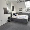 Photo 2: Bed is convertible single bed and sofa