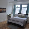Photo 4: Large double bed witj black out curtains 