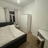 Photo 3: Double bedroom with ottoman bed, wardrobe and desk 